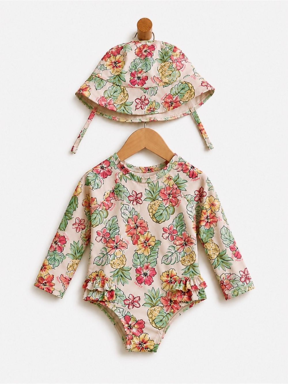 Infant swimsuit with bucket hat